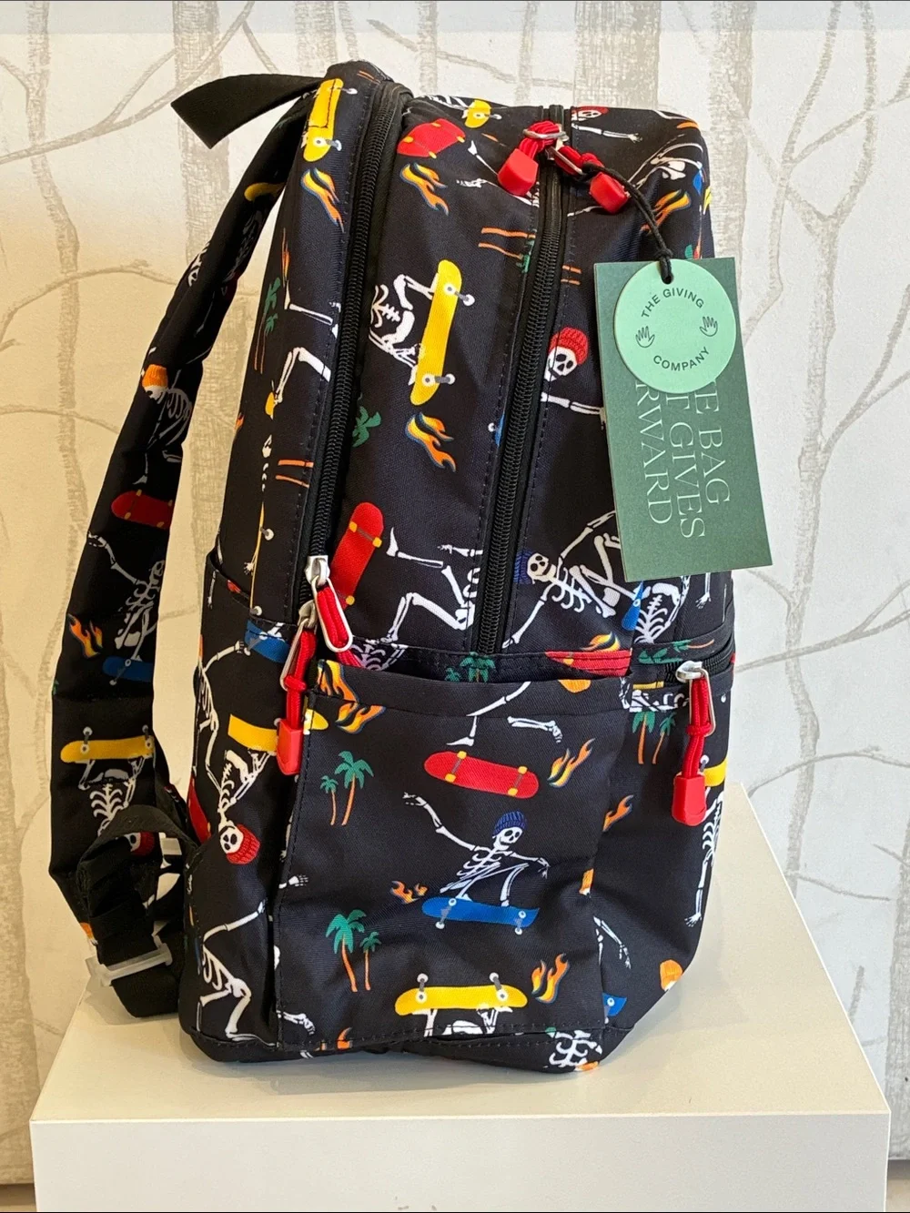 STATE Black Backpack with Multicolor Skate Skeleton Print
